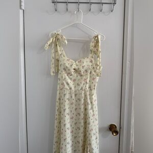Floral dress with thigh slit & bow tie strap detail